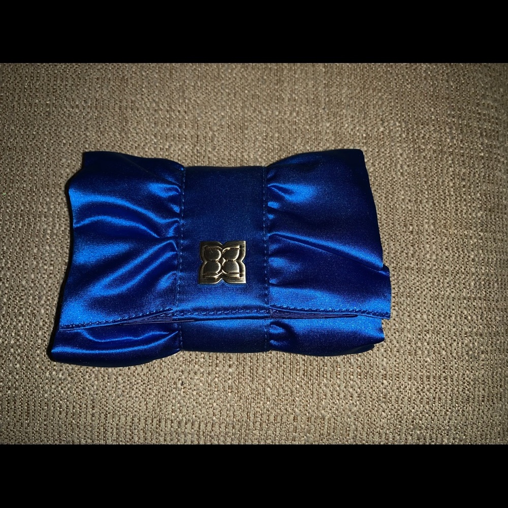 Like new royal blue BCBGMaxazria clutch.